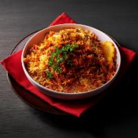 Hyderabad Vegetable Dum Biryani · Hyderabadi dum style biryani cooked with basmati rice and veggies. Served with side of yogur...