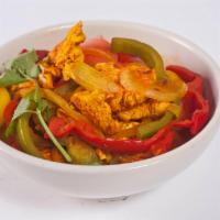 Chicken Jalfrazie · Tender pieces of boneless chicken, sprinkled with mild spices and sauteed with fresh tomatoe...