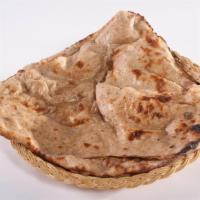 Paratha · Roti buttered bread baked in the tandoor. Served with mint chutney.