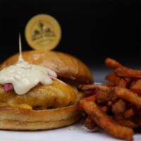 50/50 Burger with Sweet Potato Fries · 50/50 halal beef and lamb (quarter-pound) burger with cheddar and pickled red onion with gar...
