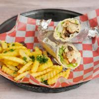 Chicken Shawarma Sandwich · Thin slices of marinated chicken cooked on a slow revolving rotisserie. Served in a pita pac...