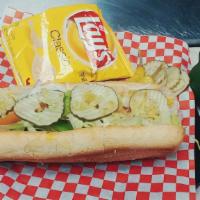 Cold Roast Beef Sub · Roast beef, lettuce, tomatoes, onions, and bell peppers. Served with pickles, pepperoncini, ...