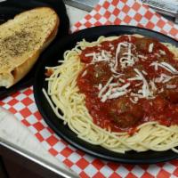 Spaghetti with Meatballs · Generous portion of spaghetti with meatballs and grated mozzarella. Served with garlic bread.