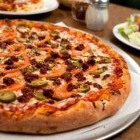 Mexican Combo Pizza · Ham, pepperoni, ground beef, sausage, linguica, jalapenos, pineapple and mozzarella cheese.