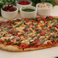 Pesto Chicken Pizza · Chicken, tomatoes, mushrooms, onion, fresh garlic, mozzarella cheese and pesto sauce.