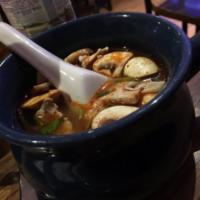 Hot and Sour Soup · Comes with mushroom and cilantro. Hot and spicy.