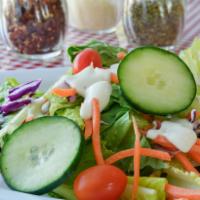 Garden Salad · Romaine lettuce, red cabbage, tomatoes, carrots and cucumber.