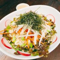 Japanese Tofu-n-Radish Salad · Cubed organic tofu, hand chopped red leaf lettuce, shredded Japanese daikon radish and carro...