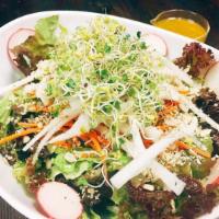 Chef's Green Salad · Hand-chopped red leaf lettuce, shredded Japanese daikon radish and carrots, sliced radish, s...