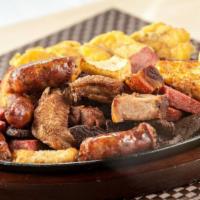Picadera el Conuco · Queso, salami, chicharron de pollo, longaniza, orejita, chicharron de cerdo, carne frita and...