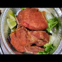 Chuleta de Cerdo a La Plancha · Grilled pork chops.
