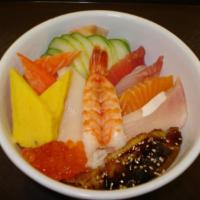 Chirashizushi · Fish pieces over rice: tuna, 2 white fish, salmon, shrimp, eel,  omelette, imitation crab an...