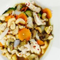 Pad Cashew Nuts · Sauteed cashew nuts, onions, carrots, baby corn, mushrooms, zucchini, and bell peppers. Serv...