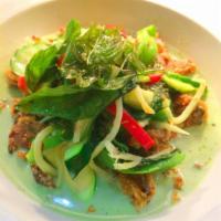 Green Curry · Coconut milk with bamboo shoots, basil leaves, green bean, zucchini and bell peppers. Served...