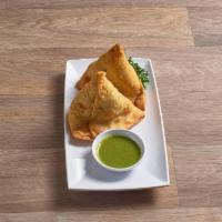2 Piece Vegetable Samosa · 2 pieces. Triangle shaped pastry stuffed with peas, potatoes, onions and spices.