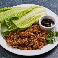 A4. Lettuce Wrap · Crisp lettuce leaves with chicken or five spice tofu with shiitake mushrooms, radish, carrot...