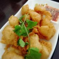 A5. Salt and Pepper · Lightly battered. Fried with scallions and peppers.