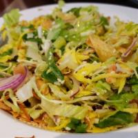 B3. Mango Salad · Refreshing salad made with mangoes, onions, cabbage, cucumbers and dried shrimp.