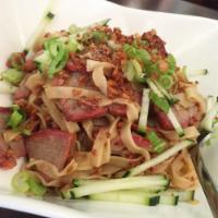 C1. Garlic Noodles · Noodles tossed with garlic and scallions in a tasty sauce. Topped with your choice of meat.