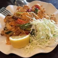 C4. Burmese Pad Thai · Noodles mixed with red bell pepper, onions, peanuts, pea leaves, cabbage and egg.