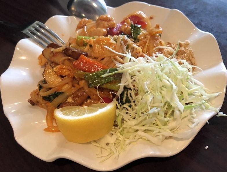 C4. Burmese Pad Thai · Noodles mixed with red bell pepper, onions, peanuts, pea leaves, cabbage and egg.