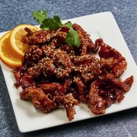 E7. Sesame Chicken · Slices of chicken breast lightly fried in a sweet and tangy sauce. Topped with sesame seeds.