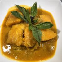 E9. Pumpkin Chicken · Chicken stew slow-cooked with kabocha squash, garlic, ginger and onion.