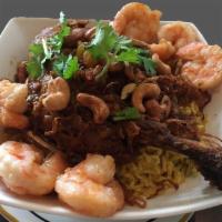 E10. Chicken and Shrimp Biryani · Braised chicken leg (on the bone) and shrimp buried in a clay pot baked with biryani rice, r...