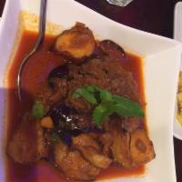 J2. Burmese Curry Eggplant · Sauteed eggplant with garlic and scallions in chili sauce. Vegetarian.