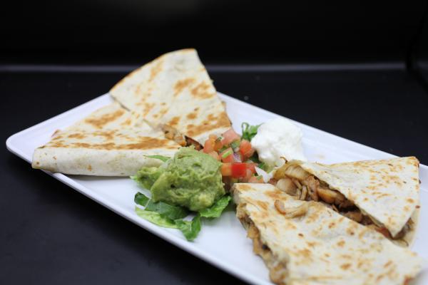 Quesadilla · Flour tortilla with melted cheese your choice of meat, garnished with sour cream, guacamole and pico de gallo. Add non dairy cheese and sour cream for an additional charge. Plant based friendly.