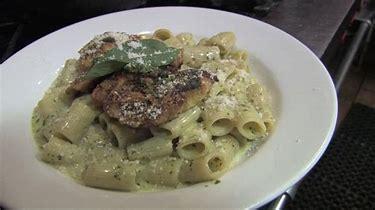 Chicken Pesto Rigatoni · Tubular rigatoni pasta with grilled chicken tender tossed in a creamy pesto sauce. All pastas are served with garlic bread.