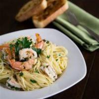 Shrimp Scampi Pasta · Shrimp scampi tossed with garlic, parsley, chopped onion and lemon served in a white wine sa...