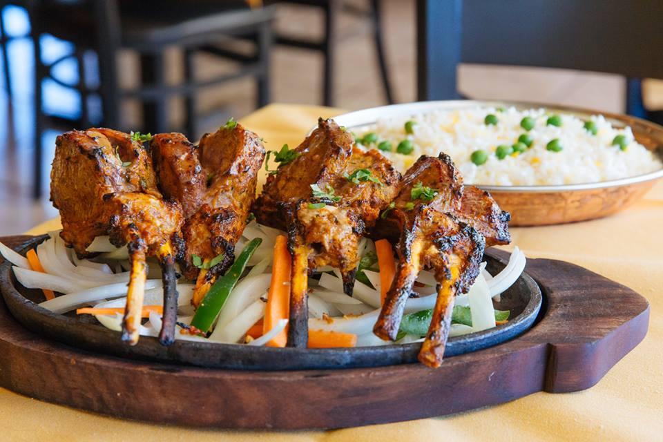 Tandoori Lamb Chops · Rack of lamb, marinated with sour cream and spices and grilled in the tandoor oven. Served with basmati rice.