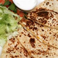 Quesadillas · Our quesadillas are made with flour corn tortillas. Stuffed with any protein preference melt...
