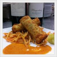 2 Pieces Crispy Curry Roll · Quick fried rolls stuffed with ground chicken, potatoes, onions and served with cucumber rel...