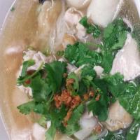4 Brother Noodle Soup · Exotic shrimp wonton, fish balls, shredded chicken, and fish cakes with a choice of rice noo...