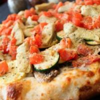 Ultimate Veggie Pizza · Ranch-style sauce, whole milk mozzarella and cheddar cheese, fresh garlic, red onions, fresh...