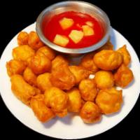 Sweet and Sour Chicken · Deep fried chicken breast in biting size served with homemade sweet and sour sauce.