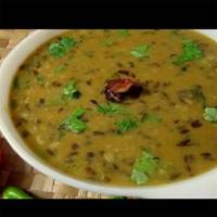 Lentil Soup · Lentils cooked with onion, garlic, ginger and mild spices. Vegan.