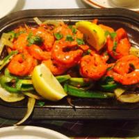 Tandoori Prawns · Prawns marinated and roasted in tandoor.