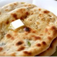Onion Kulcha · It's a treat. Leavened bread stuffed with onions, dry mango and spices.