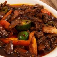 22. Yawaze Tibs · Strip of beef sauteed in seasoned butter, hot peppers, onions and our special awaze paste.