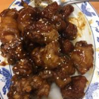 57. Sesame Chicken · Hot and spicy. 