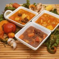 Soup of the Day · Everyday we feature a different soup: Goat Head, chicken, fish or red peas.

Please call the...
