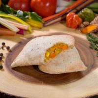 Vegetable Patty · Flaky whole wheat pastry filled with tender steamed cabbage, broccoli, corn, carrots.