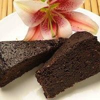 Rum Cake (Fruit Cake) · A slice of heaven! Rich dark fruit cake soaked in famous Jamaican rum. Decadent and delicious.
