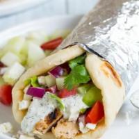 Chicken Gyro · Tender chicken served in pita bread, topped with fresh lettuce, tomatoes and onion. Drizzled...