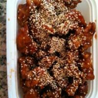 086. Sesame Chicken · Chunks of tender chicken lightly fried with chef's special sauce and sesame sauce. With stea...