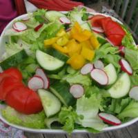 Tossed Green Salad · Romaine lettuce, tomatoes, onions, bell peppers, cucumber and pepperoncini peppers.