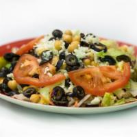 Italian Salad · Lettuce, fresh tomatoes, black olives, garbanzo beans, and mozzarella cheese